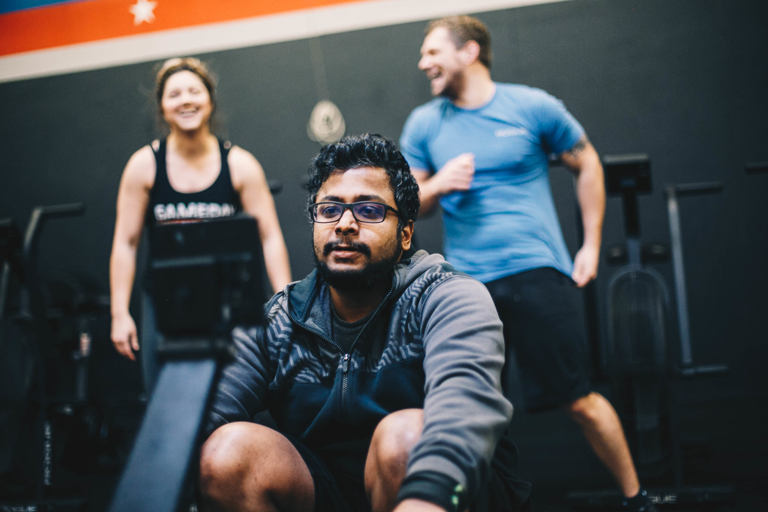 Timberwolf Fitness coach and members smiling together after a workout in Roseville, MN.